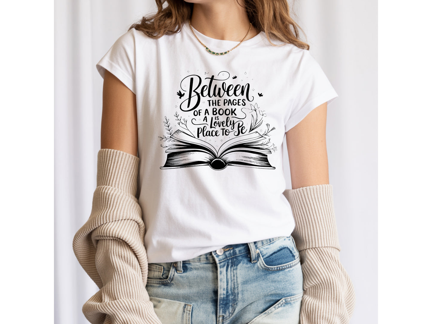 "Between the Pages of a Book Is a Lovely Place to Be" — Floral Literary Graphic Tee | Gift for Readers